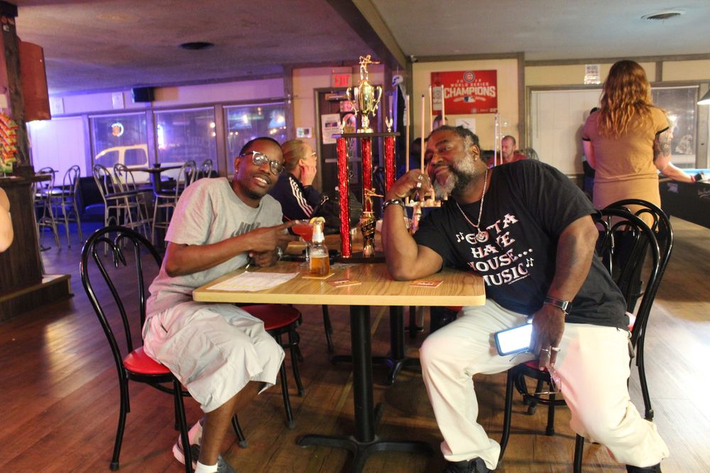 Regulars at Curley's enjoying drinks